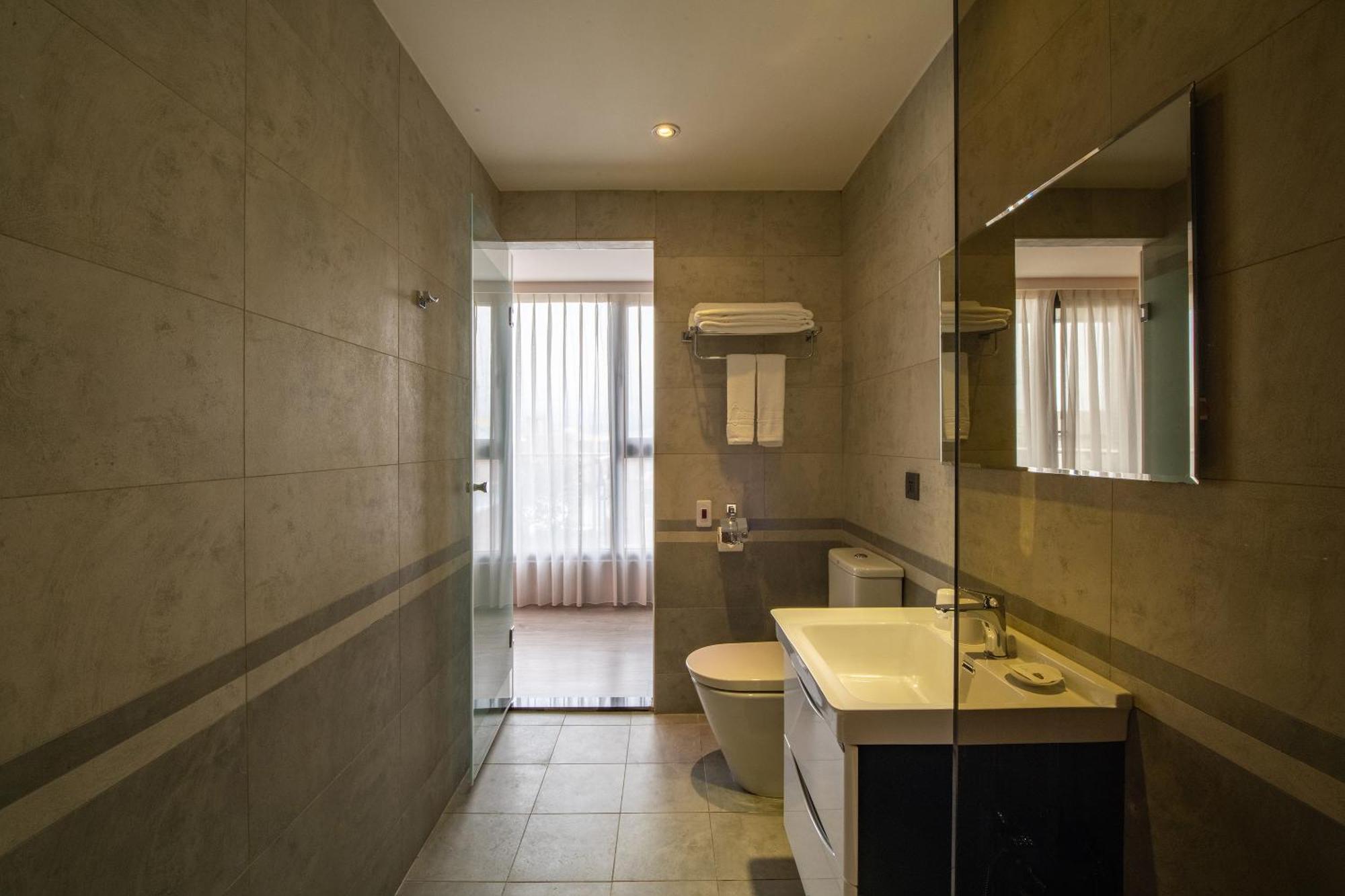 טאיצ'ונג Fengjia Hotel Bell מראה חיצוני תמונה
